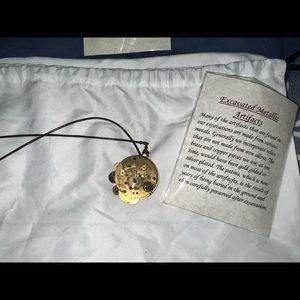 1920s watch with leather necklace.